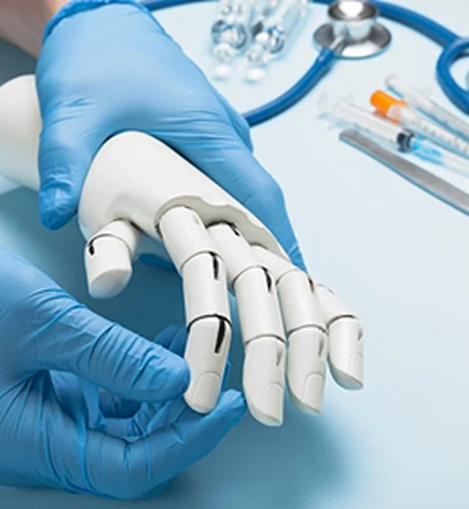 Doctor holding robotic prosthetic hand